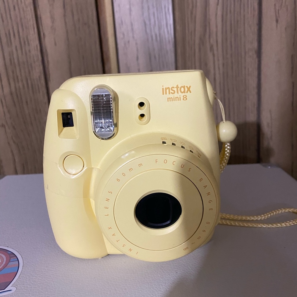 pastel yellow camera